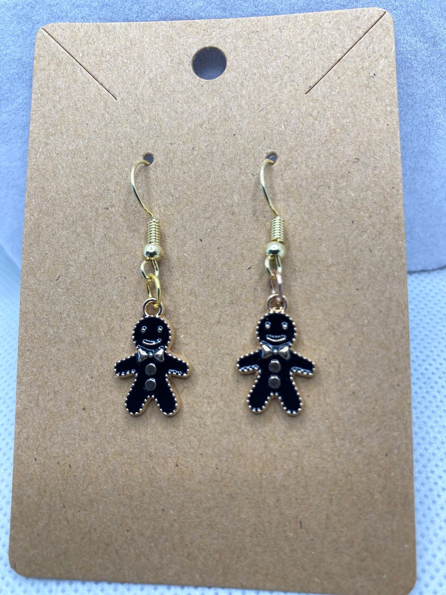 Christmas Earrings with Christmas Black Gingerbread Man Charms are perfect for the Holidays and gift-giving.